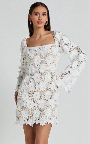 Showpo Cassie Mini Dress - Straight Neck Long Flared Sleeve Tie Back Lace Dress White | JHUYXK027