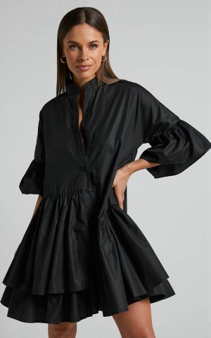 Showpo Elowen Mini Dress - Button Up Asymmetrical Tiered Smock Dress Black | VMTWUK192