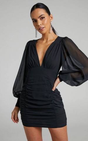 Showpo Hollis Mini Dress - Ruched Long Sleeve Plunge Neck Dress Black | JOELAV649