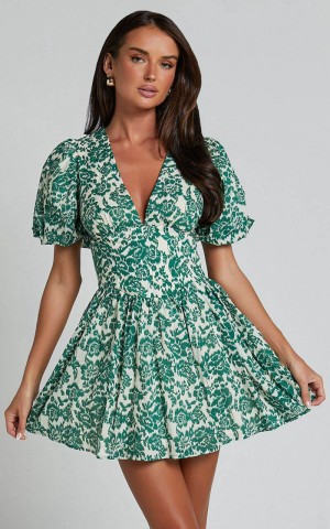 Showpo Nelli Mini Dress - Short Puff Sleeve Shirred Back Dress Green Silhouette | PAUJMW025