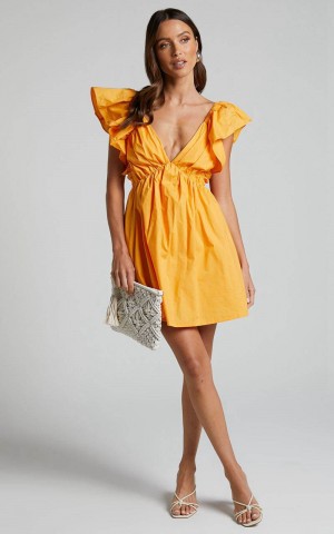 Showpo Raiza Mini Dress - Ruffle Sleeve Tie Back Plunge Dress Marigold | WXVIHK061