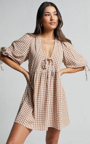 Showpo Rosita Mini Dress - Tie Front Puff Sleeve Dress Caramel & White Gingham | QXECTD632