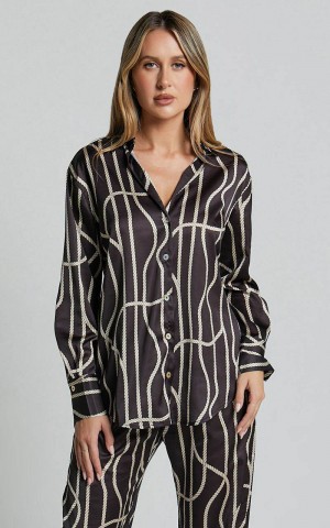 Showpo Yolanda Top - Long Sleeve Button Through Relaxed Shirt Black Gold Chain Print | GDXZIA361