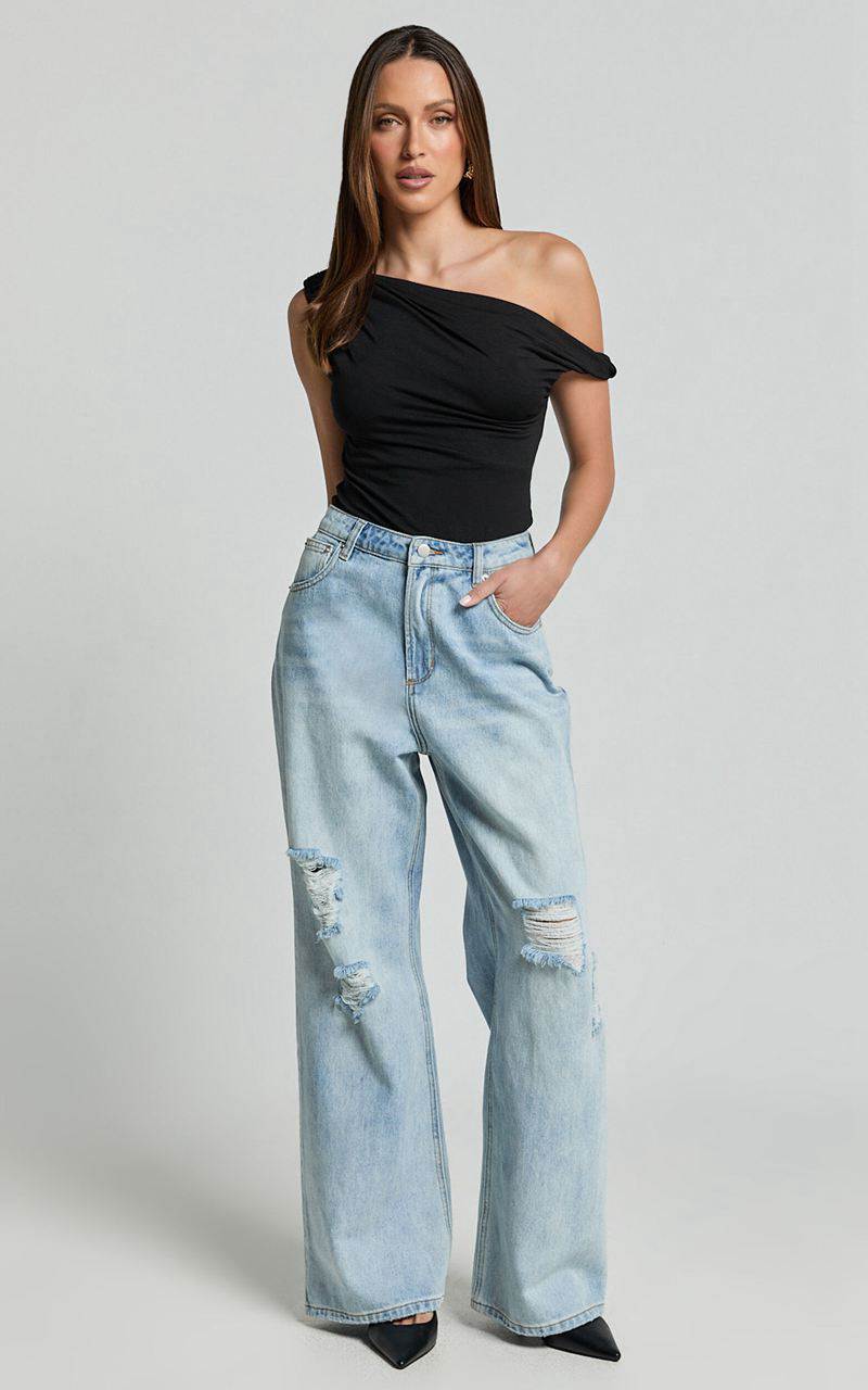 Showpo Cate Jeans - High Waist Ripped Wide Leg Recycled Denim Jeans Light Blue Wash | JYMBUT065