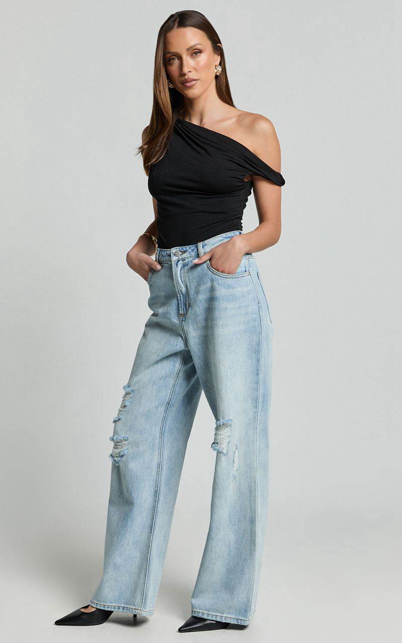 Showpo Cate Jeans - High Waist Ripped Wide Leg Recycled Denim Jeans Light Blue Wash | JYMBUT065