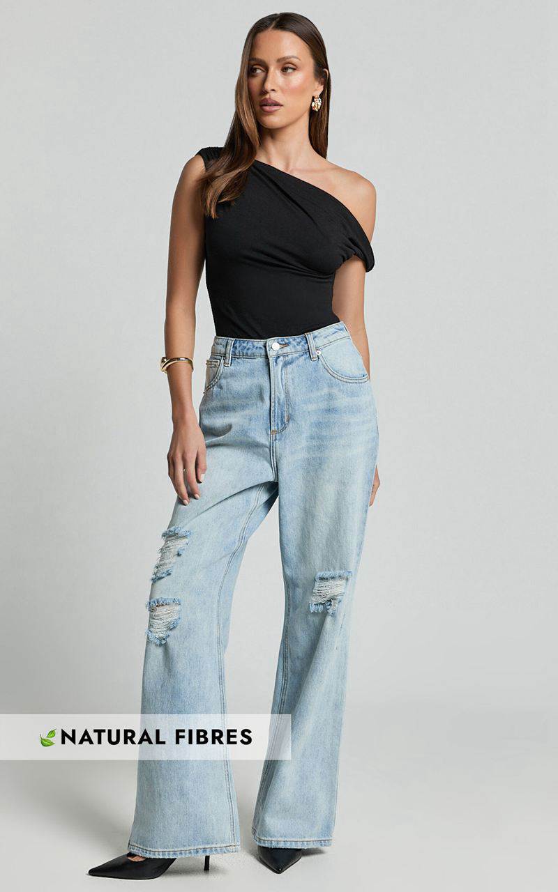 Showpo Cate Jeans - High Waist Ripped Wide Leg Recycled Denim Jeans Light Blue Wash | JYMBUT065