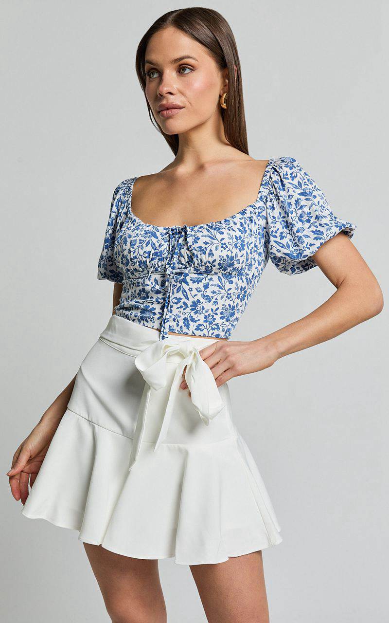 Showpo Karina Top - Puff Sleeve Ruched Bodice Corset Top Blue Floral | HWFZRK432