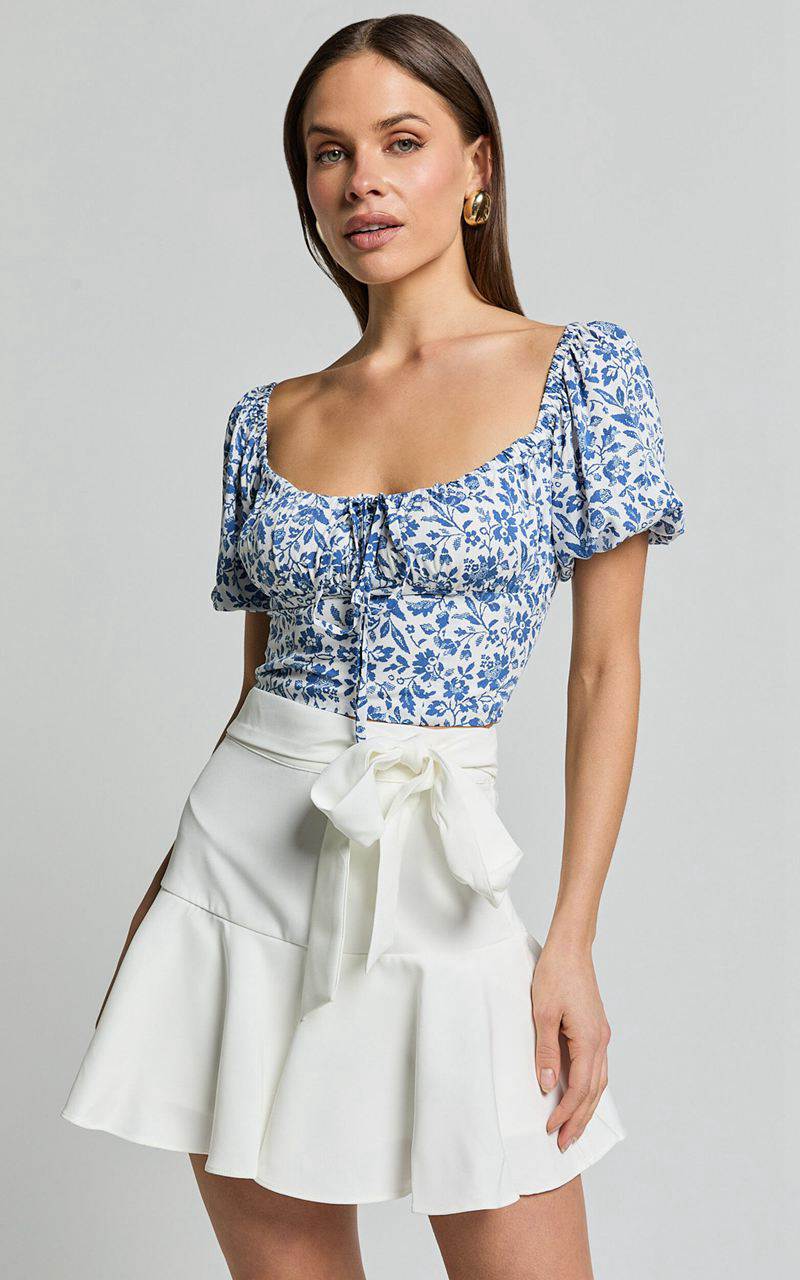 Showpo Karina Top - Puff Sleeve Ruched Bodice Corset Top Blue Floral | HWFZRK432