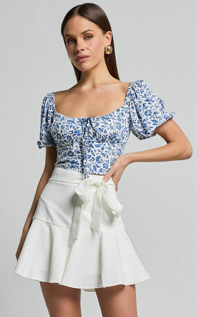 Showpo Karina Top - Puff Sleeve Ruched Bodice Corset Top Blue Floral | HWFZRK432