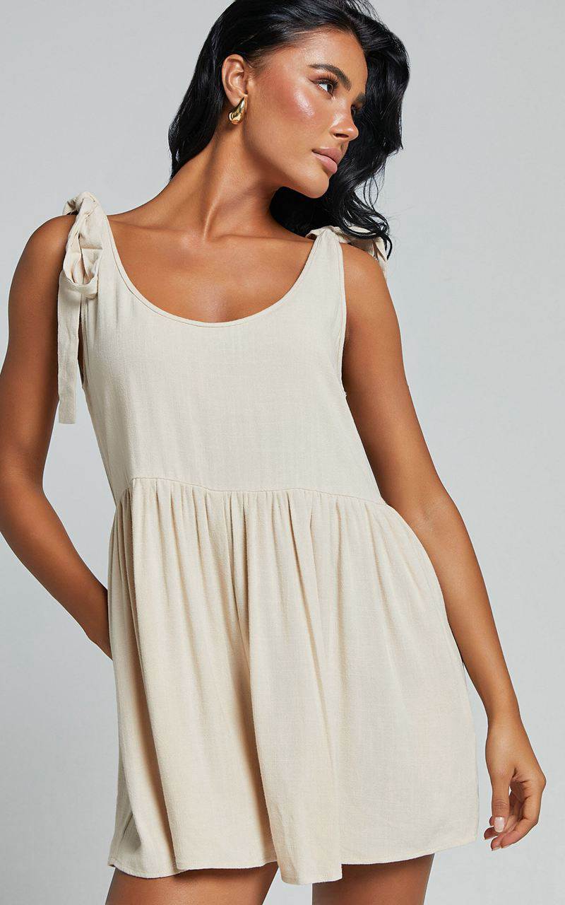 Showpo Marcie Playsuit - Linen Look Scoop Neck Tie Detail Relaxed Playsuit Biscuit | AWBLXM912