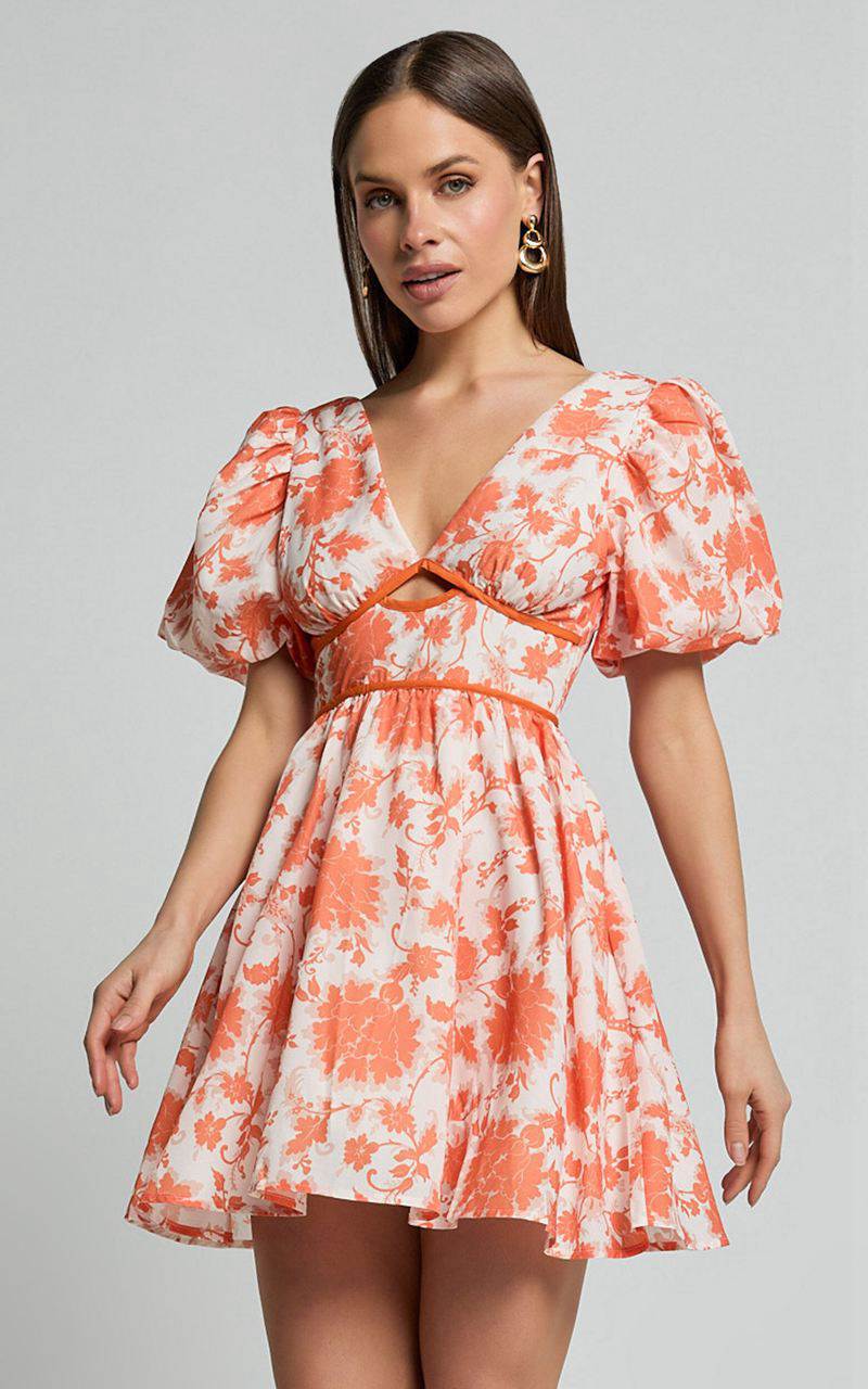 Showpo Natalia Mini Dress - Puff Sleeve Cut Out Dress Orange Floral | VCRFWN459