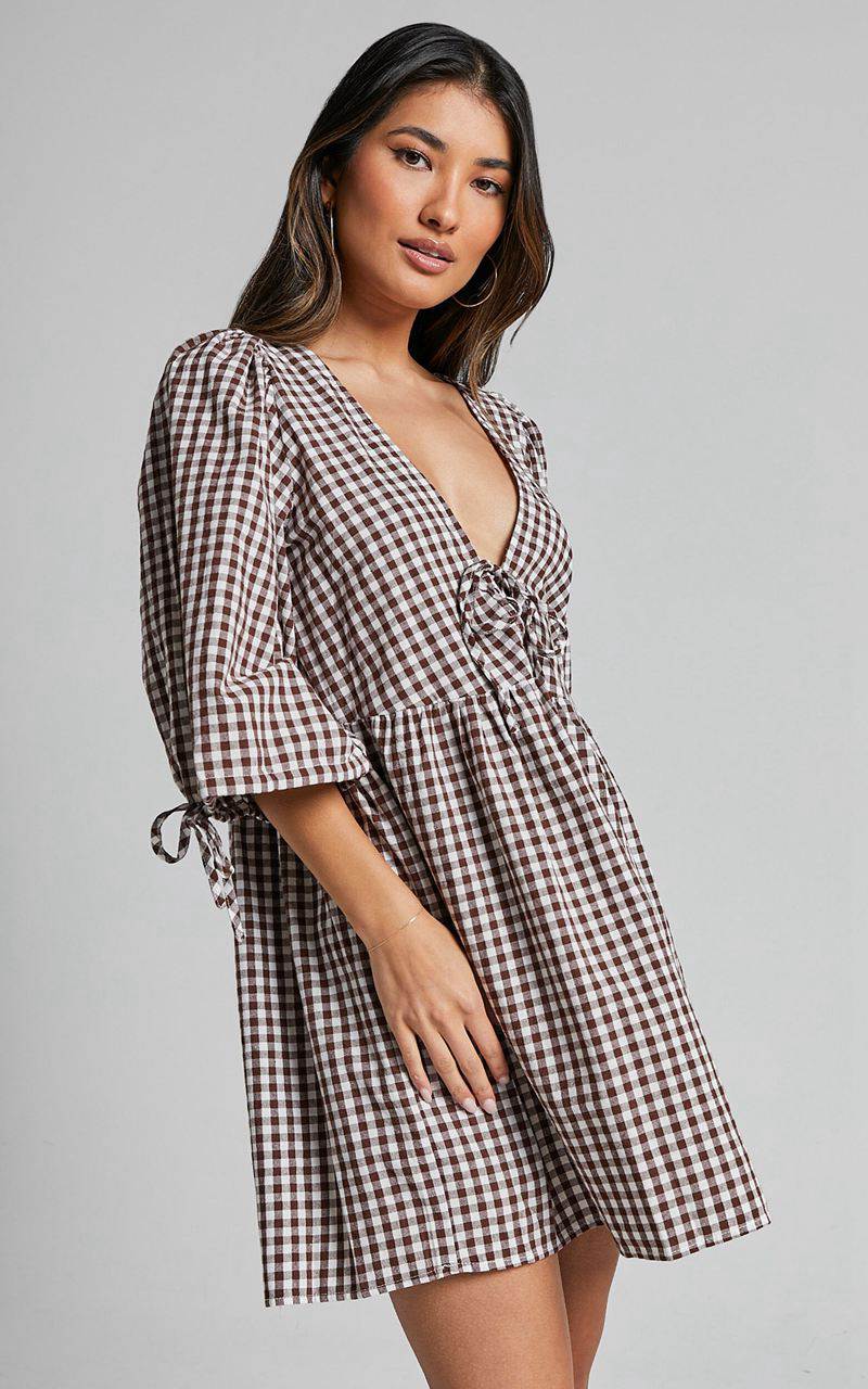 Showpo Rosita Mini Dress - Tie Front Puff Sleeve Dress Brown And White Check | RZAPBC805