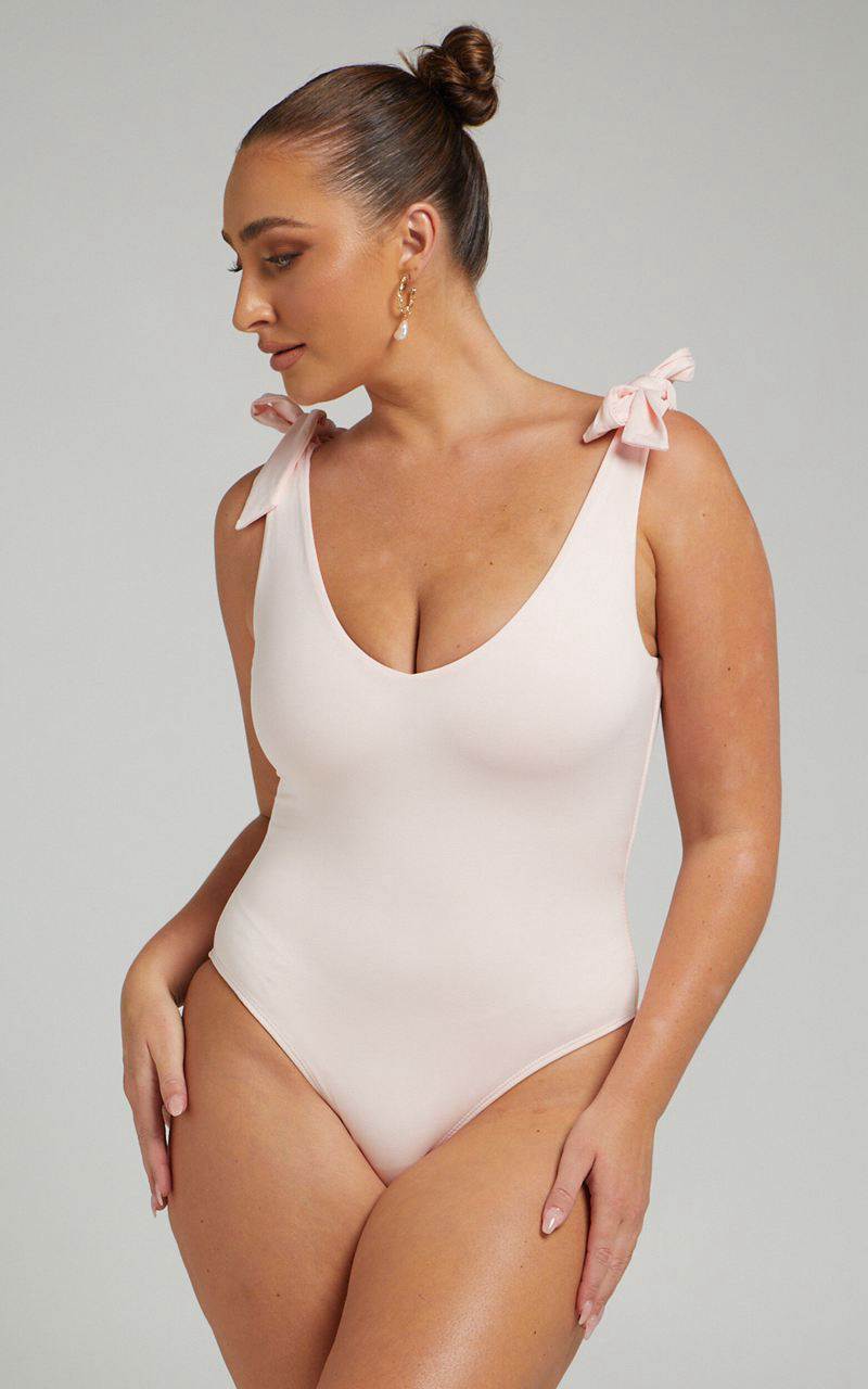 Showpo Ryley Bodysuit - V Neck Tie Up Bodysuit Pink | HZBEJG026