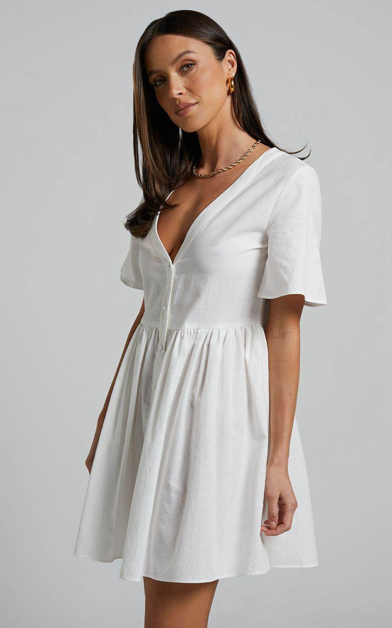 Showpo Staycation Mini Dress - Smock Button Up Dress White | EJXYHR810