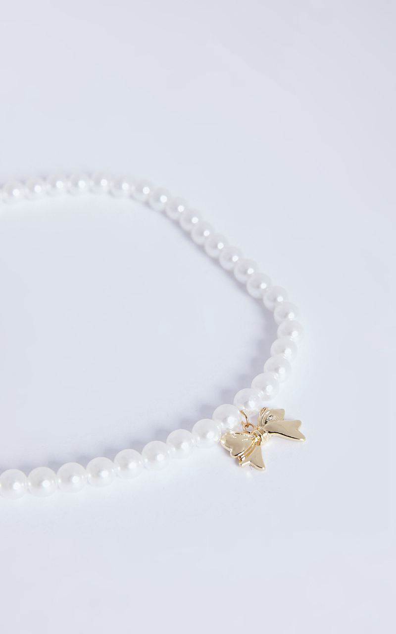 Showpo Wallace Necklace - Bow Shaped Pearl Necklace Gold | XHOELN591