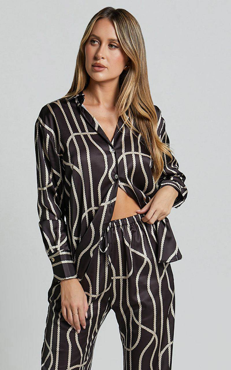 Showpo Yolanda Top - Long Sleeve Button Through Relaxed Shirt Black Gold Chain Print | GDXZIA361