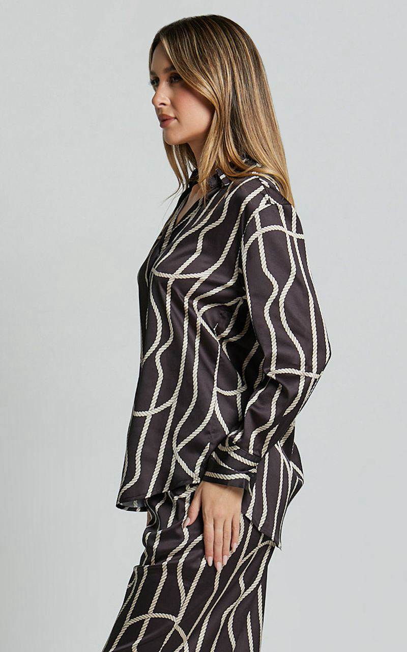 Showpo Yolanda Top - Long Sleeve Button Through Relaxed Shirt Black Gold Chain Print | GDXZIA361